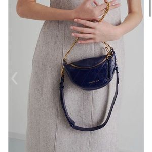 BLACK Charles and Keith Half Moon Crossbody Bag